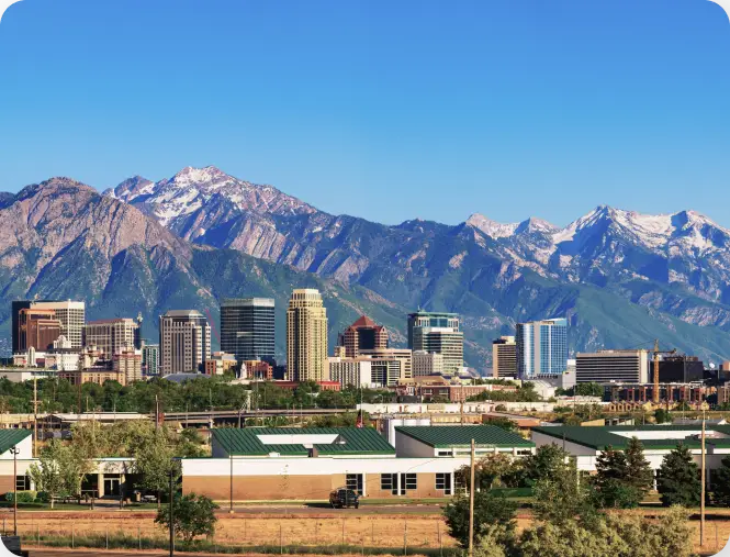 A small town in front of mountains